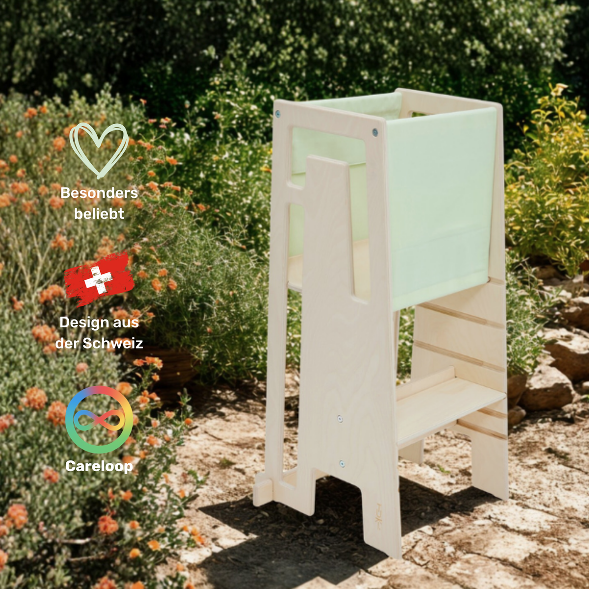 Tuki Starter Cloth Sage on the Learning Tower – safe use from 9 months